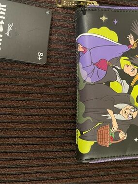 Disney Black Phone Wallet Case with Purple Trim and Neon Poison Apple